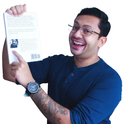 Ranajay Das holding his book Aoirei